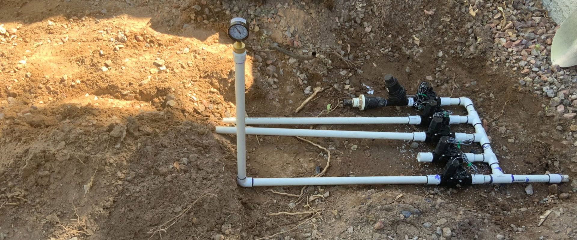 Exposed Pipe In Ground.