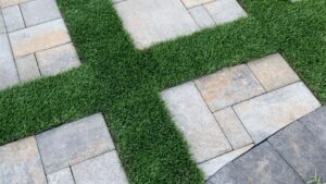 Paver Design And Artificial Grass In A Yard In Las Vegas